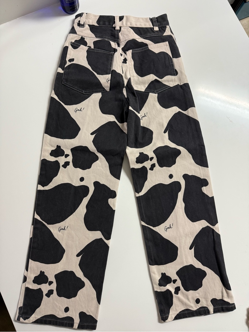 Lisa Says Gah Black and Cream Cow-Print Wide Leg Jeans - Picture 2 of 9